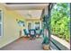Relax on the covered patio with outdoor seating and views of the backyard at 1871 W Schwartz Blvd, Lady Lake, FL 32159