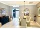 Dining room with views to the entry at 1875 Oxford Ln, The Villages, FL 32162