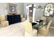 Dining area featuring an accent table and artwork at 1875 Oxford Ln, The Villages, FL 32162