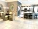 Open kitchen with a granite counter island with seating at 1875 Oxford Ln, The Villages, FL 32162