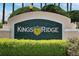 Close-up of Kings Ridge community sign surrounded by lush greenery and landscaping at 2012 Braxton St, Clermont, FL 34711