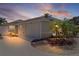 Beautiful exterior view of a single-story home featuring well-maintained landscaping and a private two-car garage at 2026 Altamonte Way, The Villages, FL 32162
