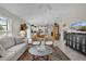 Open concept living area featuring neutral décor, comfortable seating, and a bright, airy atmosphere at 2026 Altamonte Way, The Villages, FL 32162