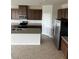 Kitchen features granite countertops and stainless steel appliances at 2048 Airedale Way, Lake Alfred, FL 33850