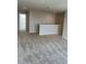Spacious loft area with neutral carpet and ample natural light at 2048 Airedale Way, Lake Alfred, FL 33850