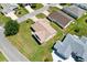 Aerial view showcases the neat landscaping and well-maintained lawn at 2104 Iveywood St, The Villages, FL 32163