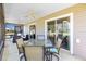 Screened lanai with ceiling fans and seating area for outdoor relaxation at 2104 Iveywood St, The Villages, FL 32163