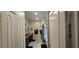 Bright bathroom featuring granite counters, tile flooring, and decorative accents at 2129 Amor Way, Leesburg, FL 34748