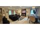 Open-concept living area with dining and comfortable seating at 2129 Amor Way, Leesburg, FL 34748