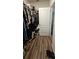 This walk-in closet provides ample room for organizing clothes and shoes, with plenty of space at 2129 Amor Way, Leesburg, FL 34748