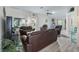 Spacious living room with high ceilings, stylish furnishings, and lots of natural light at 2256 Margarita Dr, The Villages, FL 32159