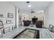 Spacious living area with hardwood floors, comfortable seating, and ample natural light at 2256 Margarita Dr, The Villages, FL 32159