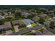 Home in neighborhood with well maintained lawns and landscaping at 25524 Maurepas Ln, Leesburg, FL 34748