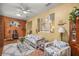 Inviting living room features a decorative brick wall, neutral paint, and comfortable seating arrangements at 25524 Maurepas Ln, Leesburg, FL 34748