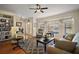 Cozy living room with natural light, comfortable seating, and stylish decor at 27022 Racquet Cir, Leesburg, FL 34748