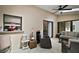 A versatile sun room with tile flooring, ceiling fan and views of the yard at 27022 Racquet Cir, Leesburg, FL 34748
