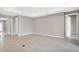 Spacious living room showcasing neutral walls, tile flooring, and an open layout ideal for entertaining at 2786 Top Hill Ct, Minneola, FL 34715