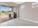 View of a porch featuring sliding glass doors and a stainless steel grill, perfect for outdoor cooking at 2786 Top Hill Ct, Minneola, FL 34715