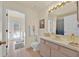 Bathroom has a vanity and direct access to the pool area at 2855 Picadilly Cir, Kissimmee, FL 34747