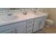 Bathroom featuring dual sinks and ample counter space at 2855 Picadilly Cir, Kissimmee, FL 34747