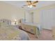 This bedroom offers two twin beds, a ceiling fan, and a closet at 2855 Picadilly Cir, Kissimmee, FL 34747