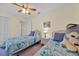 This bedroom has two beds, a ceiling fan, and a closet at 2855 Picadilly Cir, Kissimmee, FL 34747