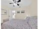 This bedroom offers a ceiling fan and ample natural light at 2855 Picadilly Cir, Kissimmee, FL 34747