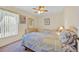 This bedroom has two beds, a ceiling fan, and a dresser at 2855 Picadilly Cir, Kissimmee, FL 34747