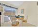 Breakfast nook with table and chairs, offering a view of the pool at 2855 Picadilly Cir, Kissimmee, FL 34747