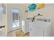 The laundry room features a door to the backyard at 2855 Picadilly Cir, Kissimmee, FL 34747