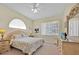 Serene bedroom featuring neutral walls, carpet flooring, and coordinated furnishings, creating a relaxing retreat at 2855 Picadilly Cir, Kissimmee, FL 34747