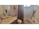 Bathroom featuring a tub/shower combo with a shower curtain and a modern vanity at 3096 Maywood Ct, The Villages, FL 32162