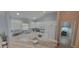Modern kitchen featuring white cabinets, granite countertops, and stainless steel appliances at 3096 Maywood Ct, The Villages, FL 32162