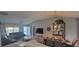 Open-concept living and dining space featuring vaulted ceilings, modern lighting, and a functional layout at 3096 Maywood Ct, The Villages, FL 32162