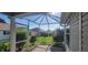 Screened-in patio offers an outdoor living space with privacy and protection from insects at 3096 Maywood Ct, The Villages, FL 32162