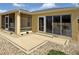 Charming screened patio with stone pavers and an outdoor dining area perfect for relaxation at 3325 Archer Ave, The Villages, FL 32162