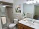 Bathroom with shower, double sink, and natural light at 33635 Jeffery Ct, Leesburg, FL 34788