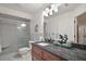 Bright bathroom with a glass-enclosed shower, updated vanity, and tiled floors at 33635 Jeffery Ct, Leesburg, FL 34788