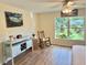 Bedroom features a tropical view outside the window, along with some nautical decor at 33635 Jeffery Ct, Leesburg, FL 34788