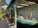 Covered boat lift with waterfront access at 33635 Jeffery Ct, Leesburg, FL 34788