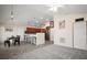 Spacious kitchen with breakfast bar, seamlessly connecting to the living area for modern living at 33635 Jeffery Ct, Leesburg, FL 34788