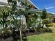Exterior showcases beautiful, lush landscaping around the home, creating a serene outdoor space at 33635 Jeffery Ct, Leesburg, FL 34788
