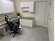 This office area includes built in cabinets, drawers, and countertops for comfortable work from home at 33635 Jeffery Ct, Leesburg, FL 34788