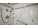 Shower with custom tilework and corner shelves at 33635 Jeffery Ct, Leesburg, FL 34788