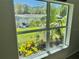 Bright window offers a view to the backyard and gazebo at 33635 Jeffery Ct, Leesburg, FL 34788