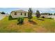 A spacious backyard with a shed and well-maintained lawn at 37045 Scenic Ridge Dr, Grand Island, FL 32735