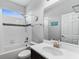 Bathroom with a tub-shower combination and modern vanity at 37045 Scenic Ridge Dr, Grand Island, FL 32735