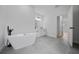 Luxurious bathroom featuring a freestanding tub and modern fixtures at 3978 Sw 151St St, Ocala, FL 34473