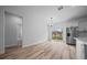 Dining area with wood floors and view of the backyard at 3978 Sw 151St St, Ocala, FL 34473