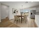 Dining area with modern table and view of the backyard at 3978 Sw 151St St, Ocala, FL 34473